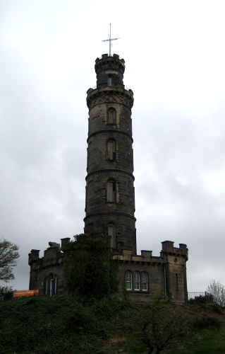 The Nelson Monument, a tall tower with a cross-shaped aerial on top of it.